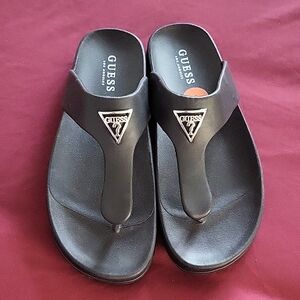 Guess Black Slide Sandals with Gold Triangle Logo